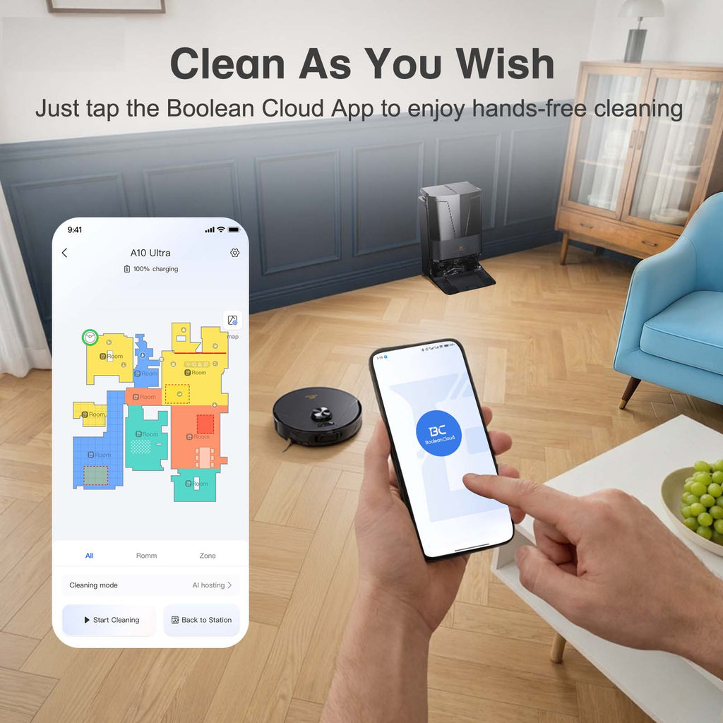 Hand holding smartphone with Boolean Cloud app controlling robotic vacuum cleaner in modern living room